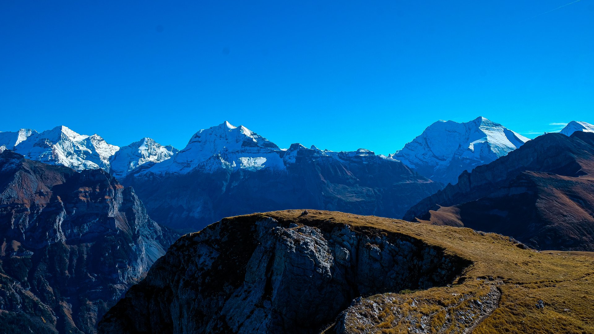 Eiger, Mönch and Jungfrau panorama with alpine ridgeline in the Bernese Oberland